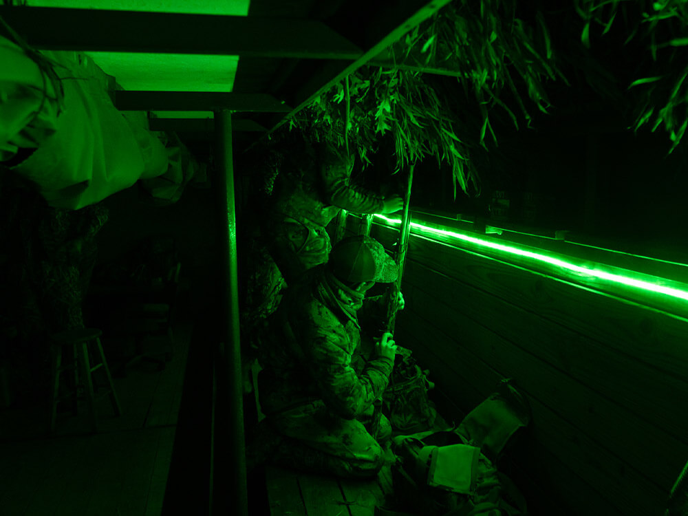 inside of hunting blind with green lights